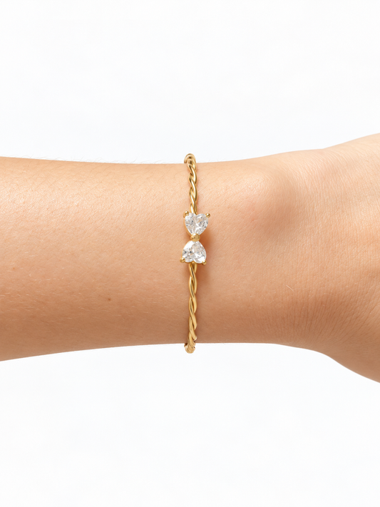Bracelete Torcido com Gotas Centrais em Zircônia
